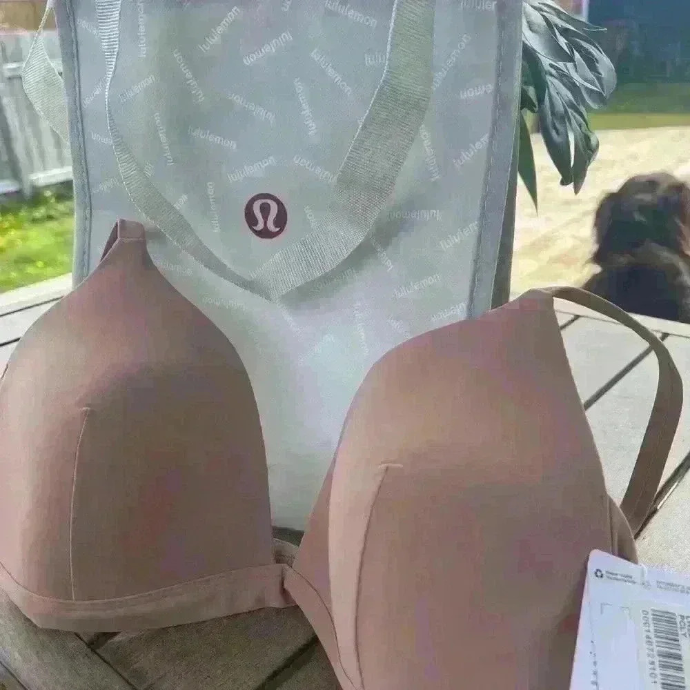 New with tags 68 USD bikini top Lululemon nude size 10  (C)👙